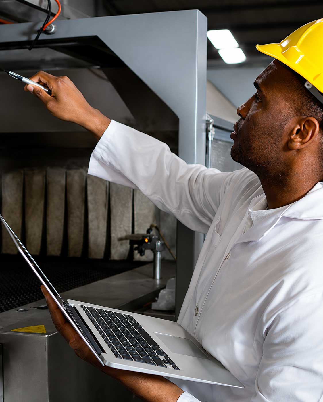 Reliability engineer reviewing plant equipment data